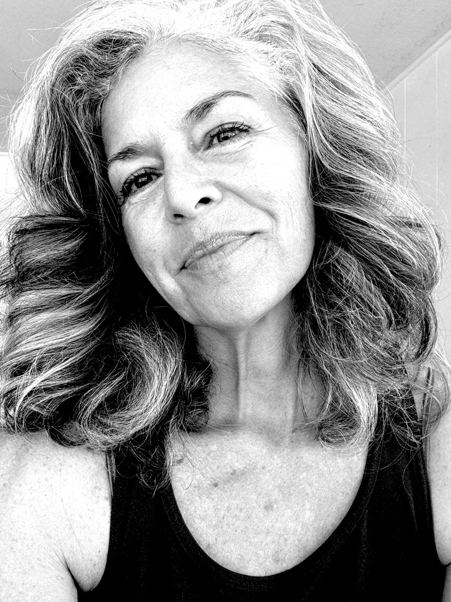 Portrait of Naiʻa Ulumaimalu Lewis, founder of Studio Wā. Black-and-white photograph, close framing, direct gaze.